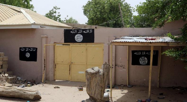 A wall painted by Boko Haram is seen in Damasak March 24, 2015. B 