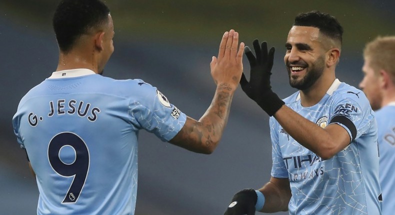 High five: Riyad Mahrez (right) scored a hat-trick as Manchester City returned to goalscoring form with a 5-0 win over Burnley