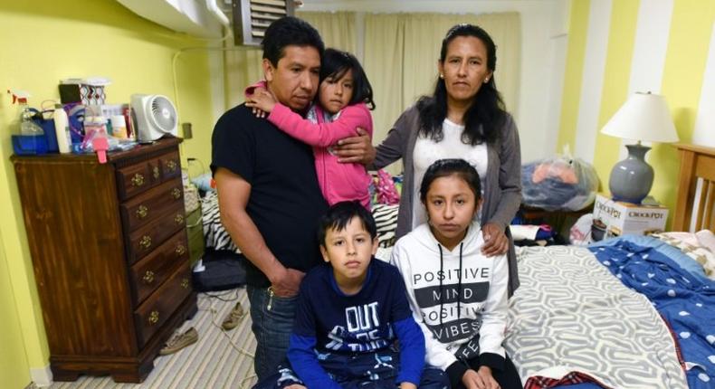 Nearly 20 years after fleeing Mexico Jeanette Vizguerra (top R) has taken refuge in a Denver church with her family for fear of being deported by immigration