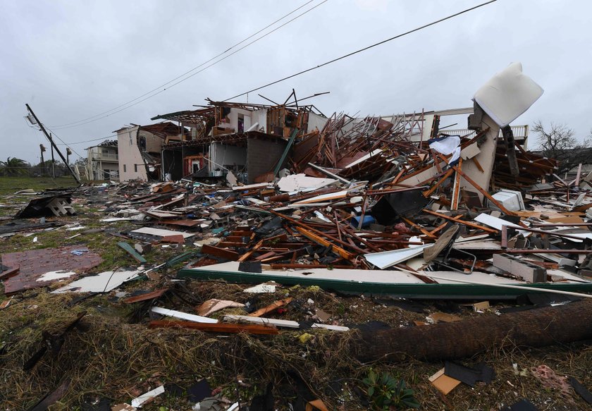 A man, who lost his home to Hurricane Harvey, is loaded into the back of an ambulance in Rockport, T