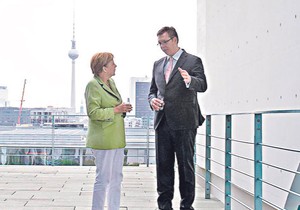 480548_merkel-vucic-06foto-reuters