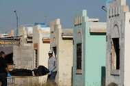 Forensic technicians remove a body from a crime scene where unidentified assailants killed and injured people living in a house at Riberas del Bravo neighbourhood, in Ciudad Juarez