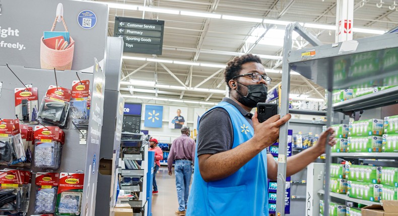 A Walmart employee works at a store in Florida.