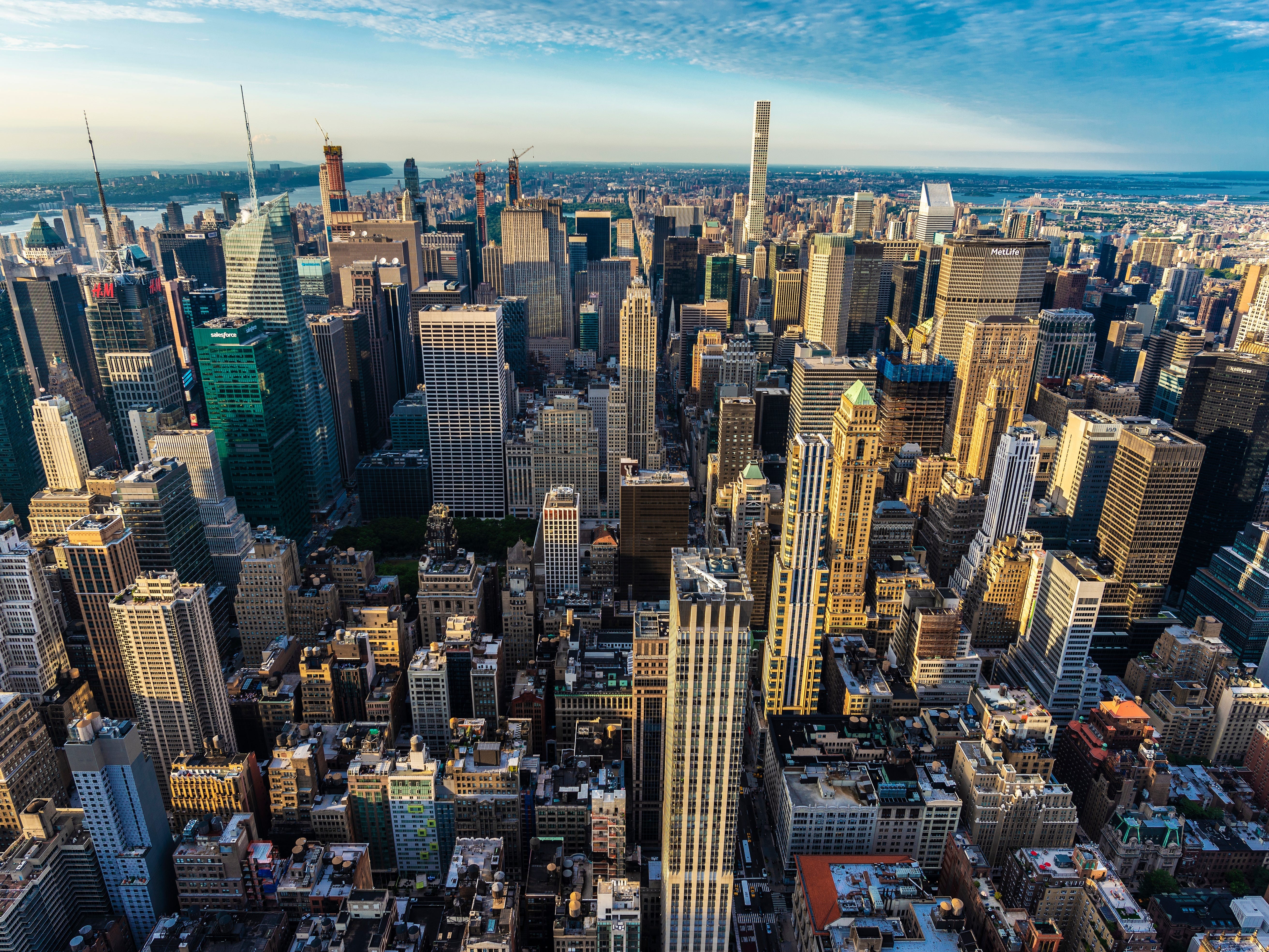 New York City, USA - August 1, 2018: Elevated view of the skyline of modern skyscrapers of Manhattan at sunset in New York City, USA
