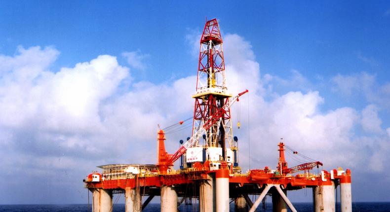 China National Offshore Oil Corporation's oil rig in China's South Sea is seen in this photograph taken February 2, 2004.