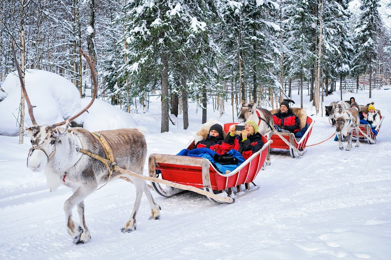 Rovaniemi,,Finland,-,March,5,,2017:,People,In,Reindeer,Sledge