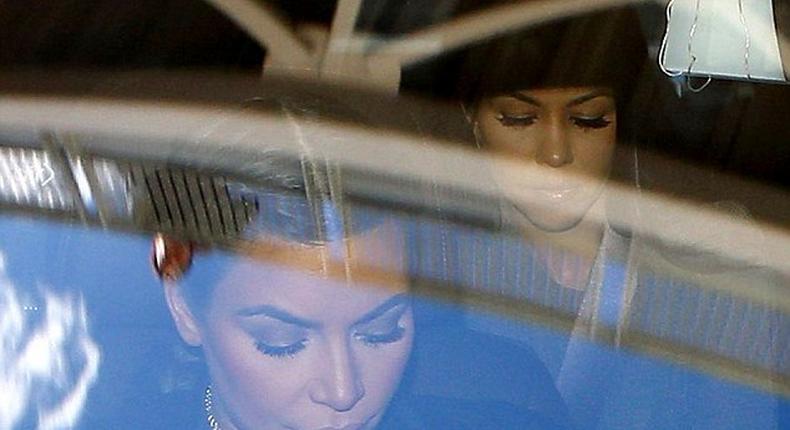 Kim and Kourtney Kardashian seen visiting Lamar Odom at Cedars-Sinai Hospital in LA as Kendall makes VS Fashion Show debut in NYC