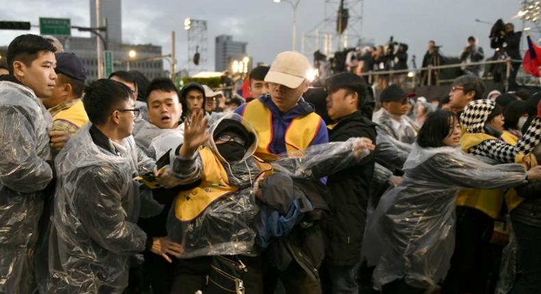 Taiwanese yellow vest protesters interrupted a New Year's Day ceremony