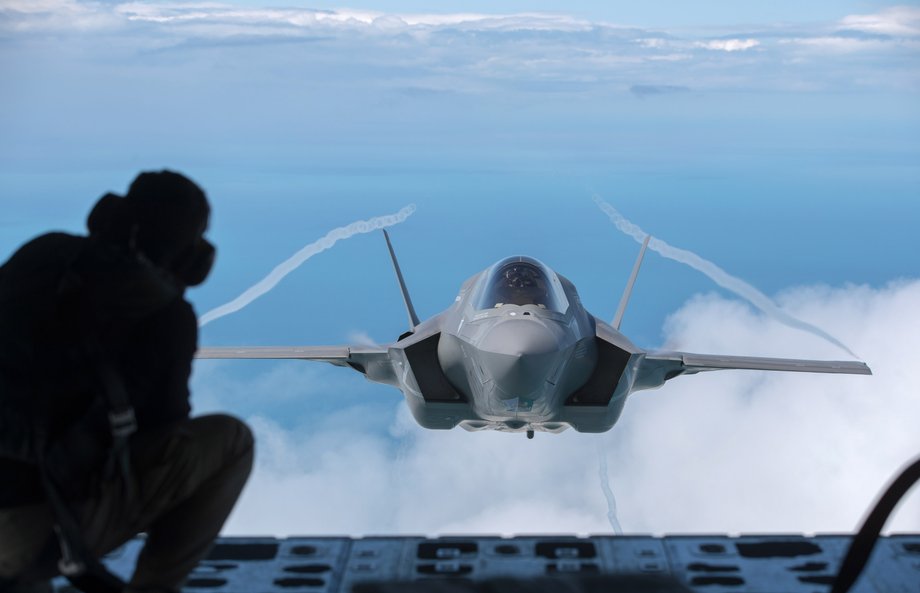 A F-35B aircraft approaches a KC-130J Super Hercules aircraft to refuel as it flies over the North Sea, having taken off from RAF Fairford on July 1, 2016.