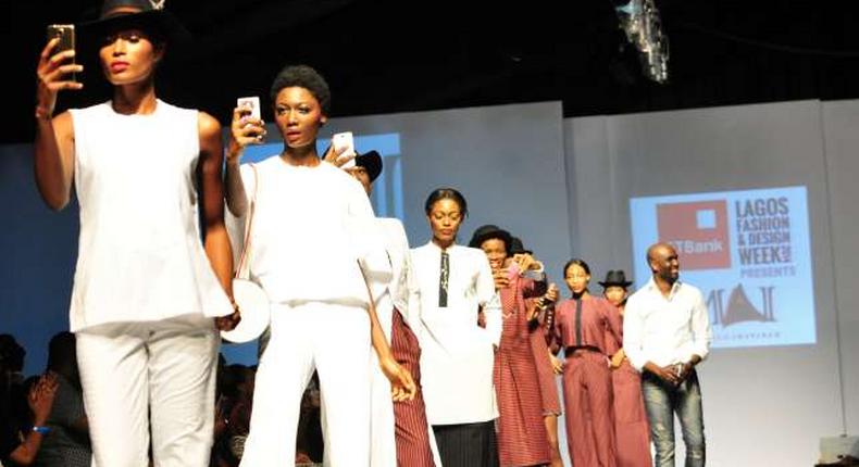 Mai Atafo takes a bow at the 2014 LFDW