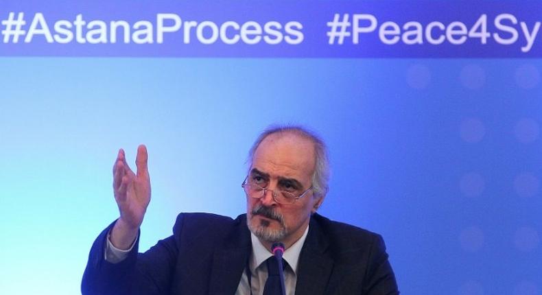 Syria's UN ambassador and head of the government delegation Bashar al-Jaafari gestures as he speaks during a press conference following the second session of Syria peace talks at the Rixos President Hotel in Astana, on February 16, 2017