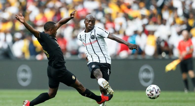 Ben Motshwari (R) of Orlando Pirates has made a full recovery after testing positive for COVID-19