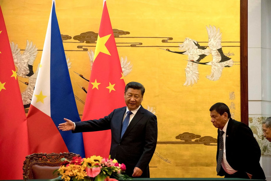 Philippine President Rodrigo Duterte, right, with Chinese President Xi Jinping before a signing ceremony held in Beijing.