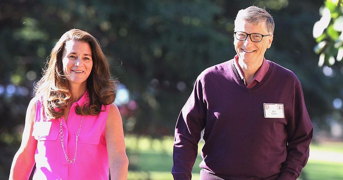  Bill and Melinda Gates, a husband and wife, are shown together outside smiling, alluding to their divorce and the division of assets.