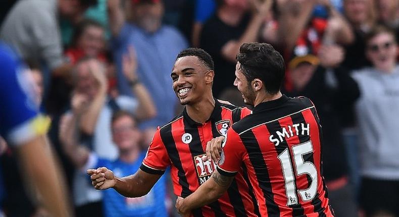 Junior Stanislas (left) scored a double as Bournemouth beat Hull 6-1