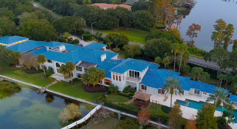 Retired NBA star Shaquille O'Neal is selling his lakeside mansion in Windermere, Florida, for $22 million.