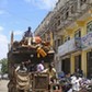 A truck drives through Bakara market in Mogadishu October 5, 2013. Street lamps now brighten some of Mogadishu's battle-scarred roads and couples hold hands at the seaside next to bombed-out beachfront buildings, a scene that would have been unthinkable w