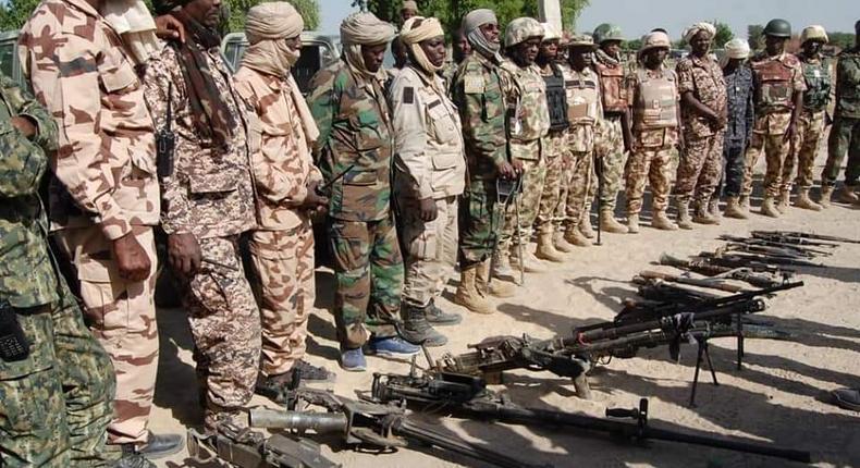 Troops of the Multinational Joint Task Force (MNJTF) consisting of Nigerian and Chadian soldiers. [Twitter/@HQNigerianArmy]