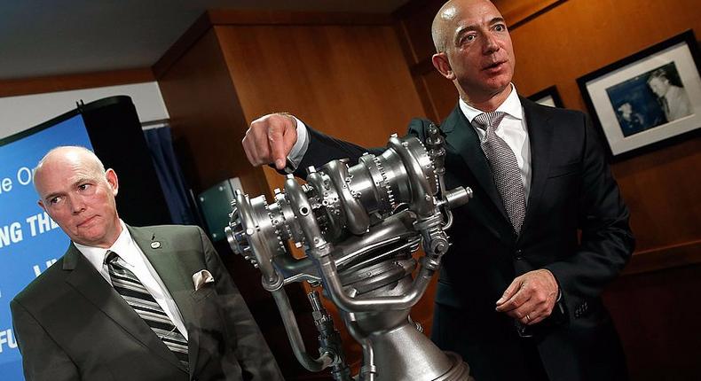 Bezos with a model rocket.