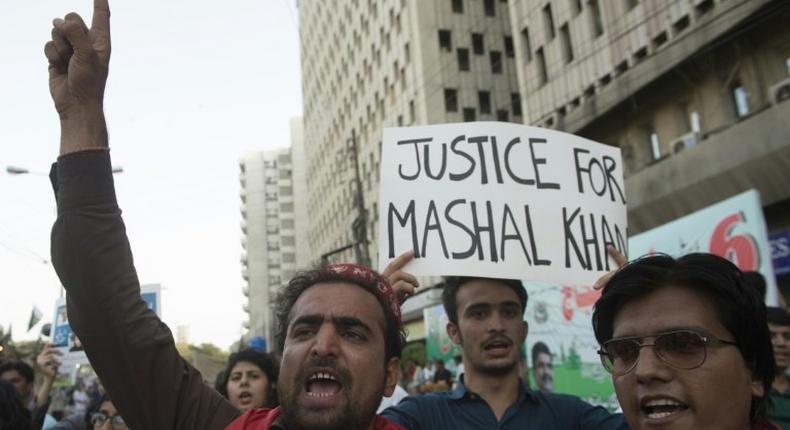 Activists shout slogans during a protest in Karachi on April 14, 2017, against the killing of student Mashal Khan by his classmates