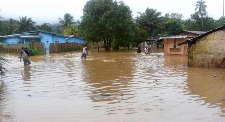 Floods kill four, government tells people to stay home