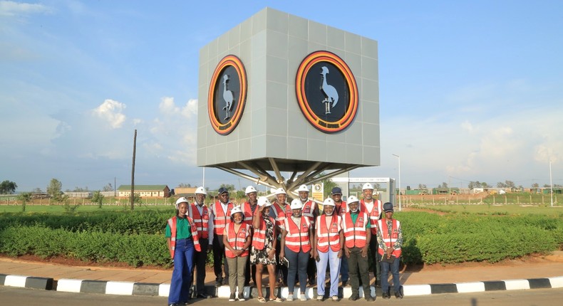 EfD-Mak Team and Inclusive Green Economy (IGE) Fellows pose for a group photo at the Kiira Motors Corporation (KMC) plant in Jinja