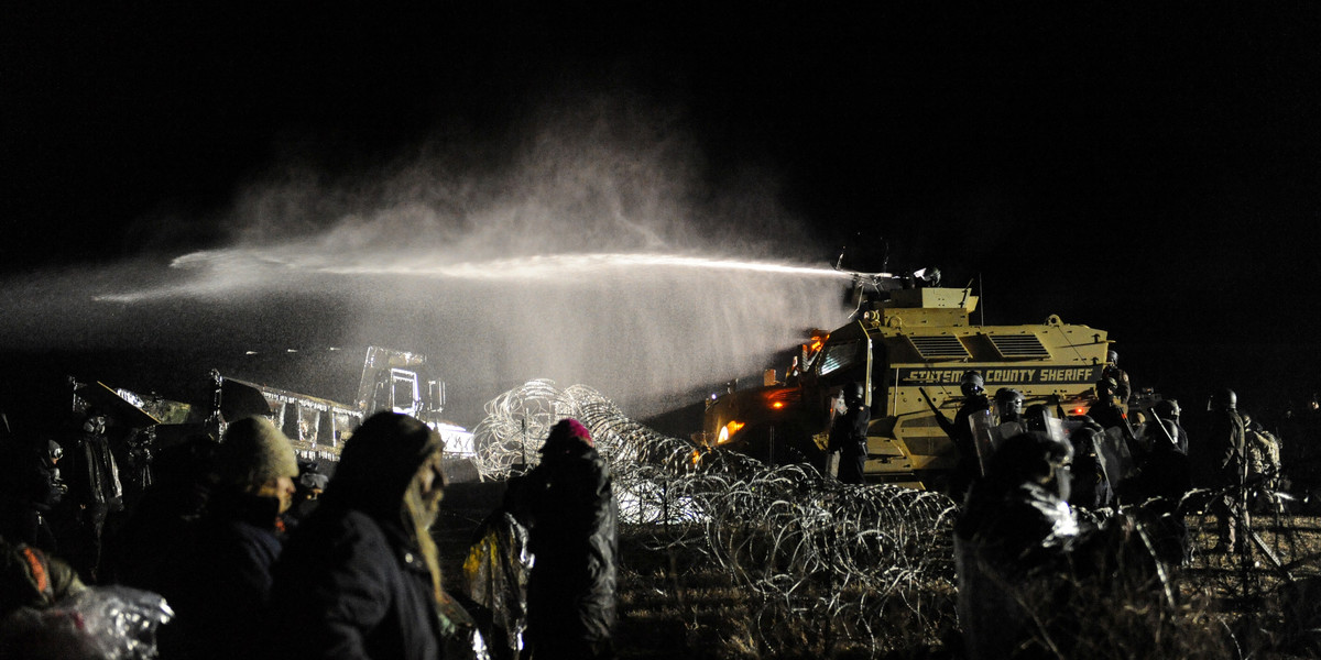 Police sprayed North Dakota Access Pipeline protesters with a 'water cannon' in freezing weather