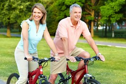 senior couple cycling