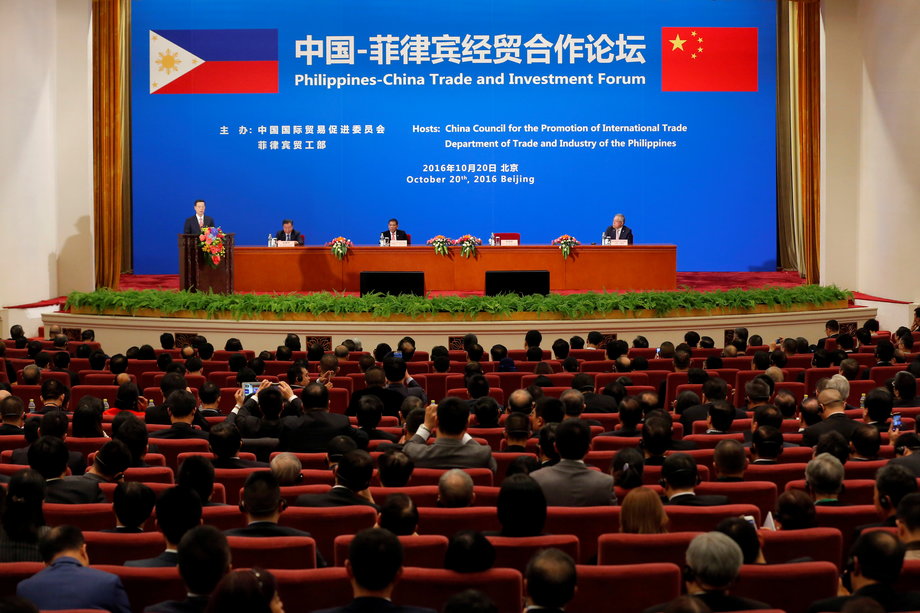 A view shows Chinese Vice-Premier Zhang Gaoli, left, and Philippines President Rodrigo Duterte, third left, attending the Philippines-China Trade and Investment Forum at the Great Hall of the People in Beijing, China, October 20, 2016.