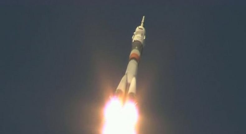 Rocket blasts off to space station with Russian, American and Briton