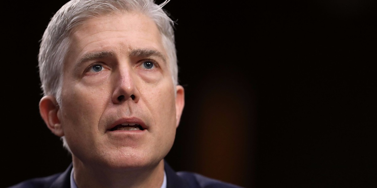 Trump's Supreme Court pick has testy exchange with top Democratic senator over his work as a professor