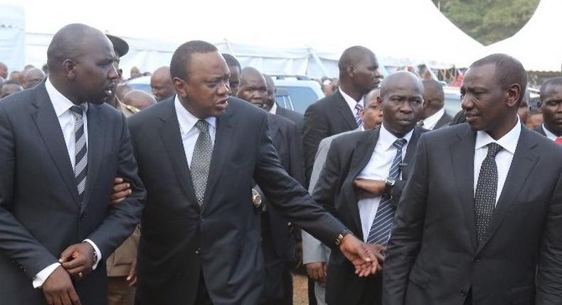 Uhuru with his deputy William Ruto and Senator Murkomen at a past function