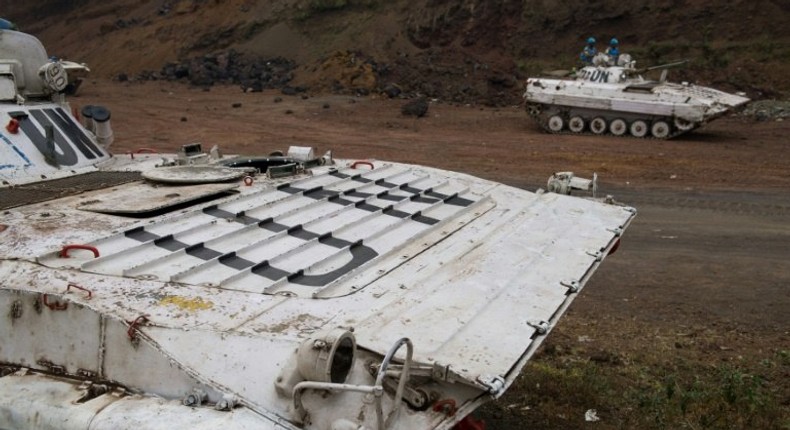 Soldiers from the United Nations Stabilisation Mission for the Congo are seen in an abandoned quarry in Munigi in the east of the Democratic Republic of the Congo in 2013