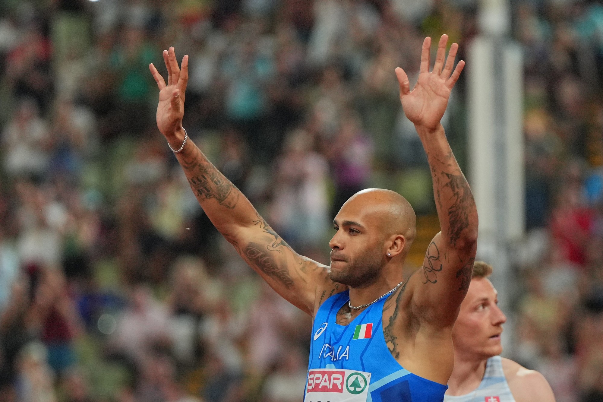 Slovenský šprintér Ján Volko (vpravo) a úradujúci olympijský šampión Marcell Jacobs z Talianska.