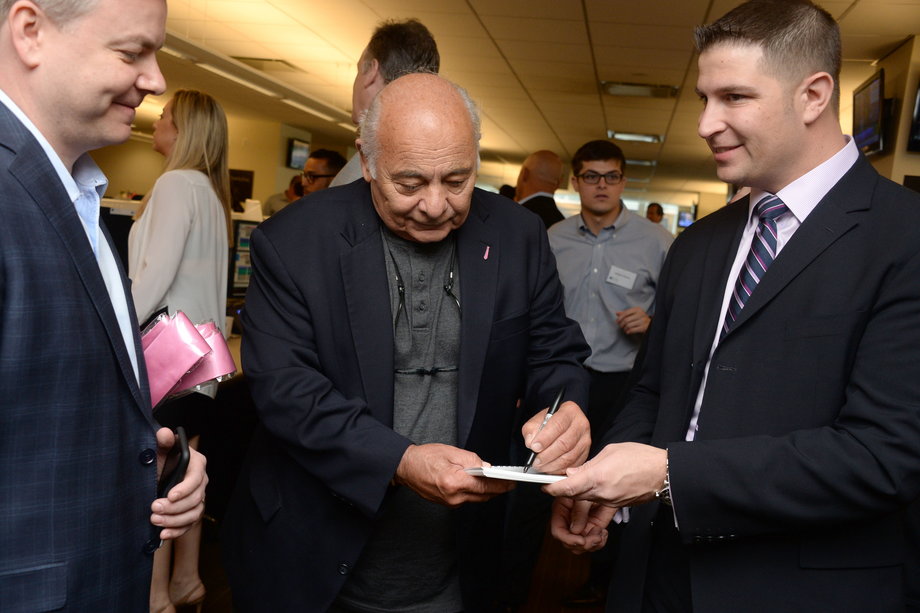 Actor Burt Young signed autographs.