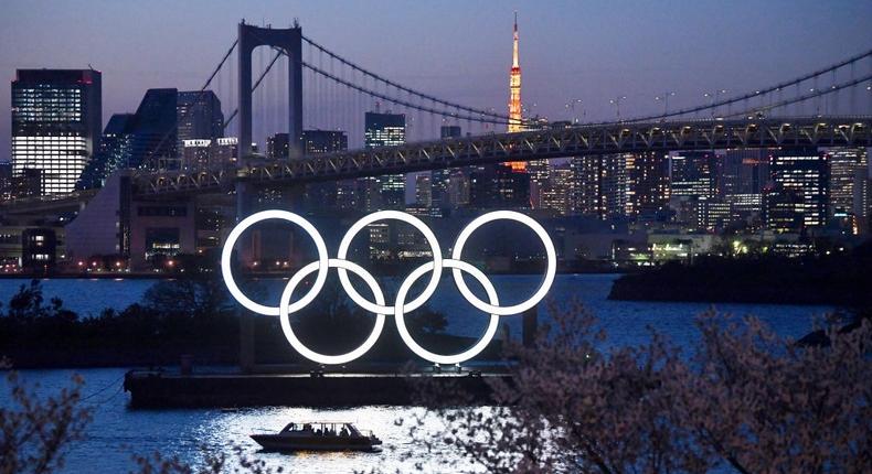TOKYO, JAPAN - MARCH 25: A boat sails past the Tokyo 2020 Olympic Rings on March 25, 2020 in Tokyo, Japan.  (Photo by Carl Court/Getty Images)