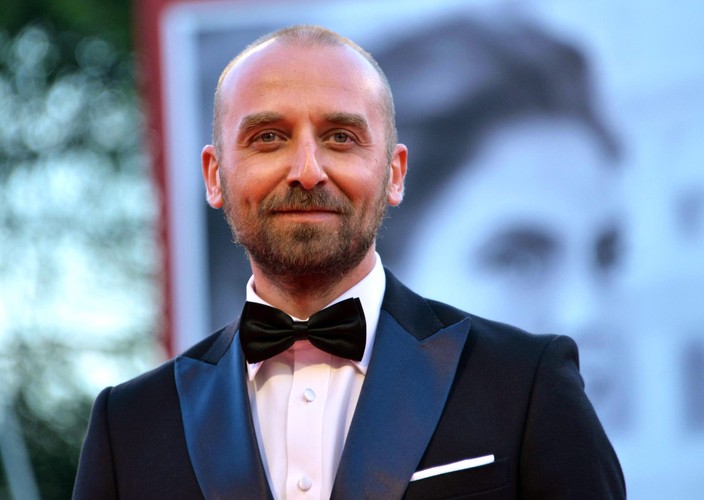 Wojciech Mecwaldowski na premierze '11 minut' w Wenecji