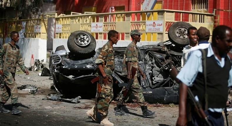 Somali government soldiers secure the scene of an attack on a restaurant by the Somali Islamist group al Shabaab in the capital Mogadishu, Somalia, October 1, 2016. 