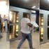 Angry man storms bank, carries printer over refusal to refund his money (video)