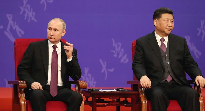 Russian President Vladimir Putin and Chinese leader Xi Jinping attend the Tsinghua University ceremony, at Friendship Palace on April 26, 2019 in Beijing, China.