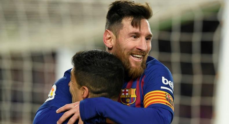 Team-mates: Lionel Messi made clear he did not want Barcelona to let Luis Suarez go