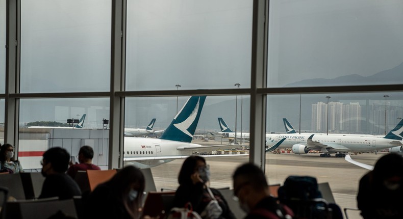 Cathay Pacific planes on the runway at Hong Kong airport.SOPA Images / Contributor / Getty