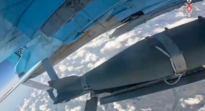In this photo taken from an undated video released by the Russian Defense Ministry shows a glide-guided bomb being released by a Russian air force jet at an undisclosed location.Russian Defense Ministry Press Service photo via AP