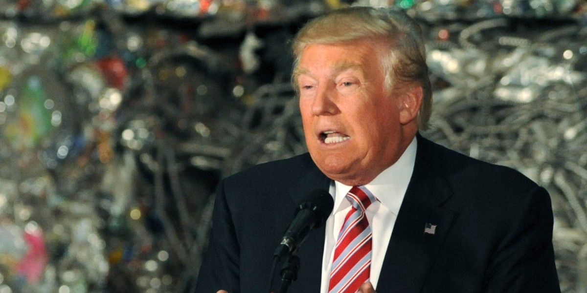 Donald Trump stands in front of compacted recycling in Pennsylvania.