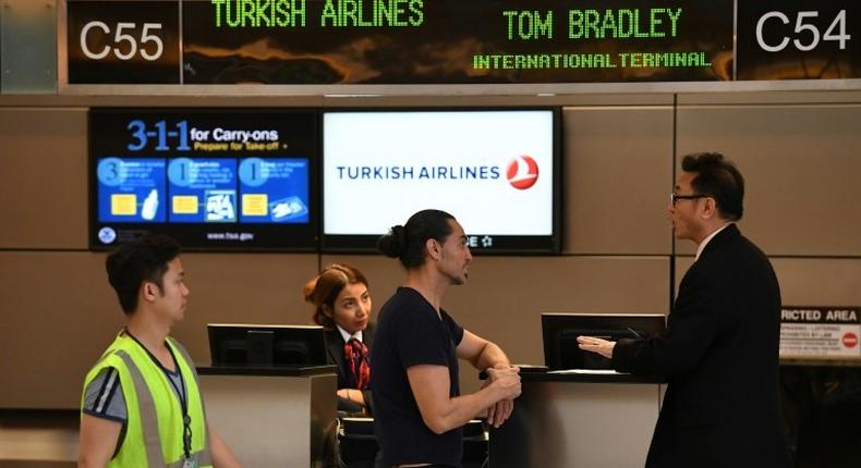 The US has lifted a ban on carrying large electronic devices in the cabin of US-bound flights from Turkey's main international airport