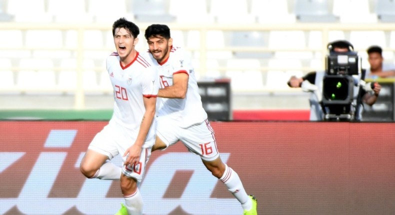 Sardar Azmoun netted both goals for in-form Iran