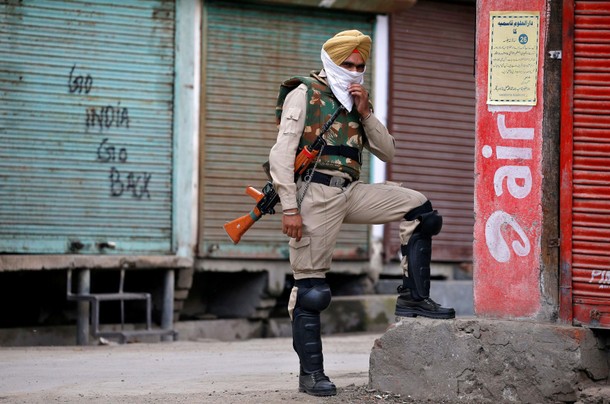 The Wider Image: Kashmir's stone-pelters face off against pellet guns