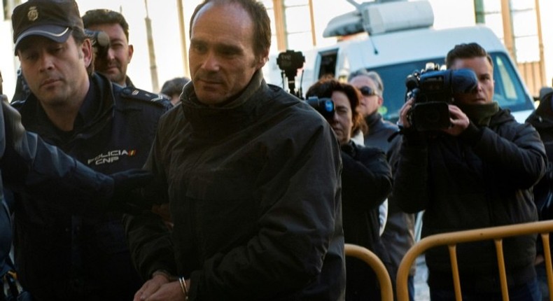 Miguel Angel Munoz (C) arrives at the provincial court of Leon, north of Spain, to be tried for the murder of a US tourist in 2015, on March 14, 2017