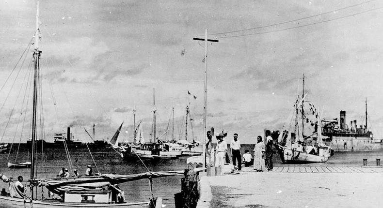 This photo from the National Archives appears to picture Amelia Earhart in the background.