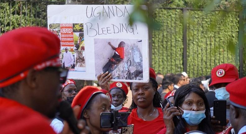 Ugandan protestors outside the UN 